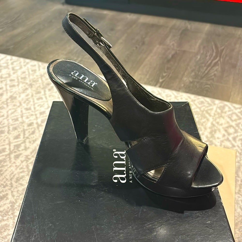 Black heel with strap, size 9.5